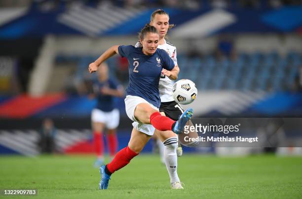 Klara Buhl of Germany battles for possession with Eve Perisset of France during the Women's International Friendly match between France and Germany...