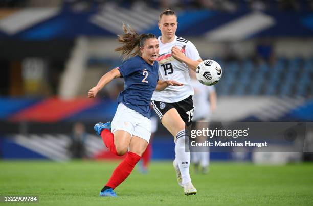 Klara Buhl of Germany battles for possession with Eve Perisset of France during the Women's International Friendly match between France and Germany...