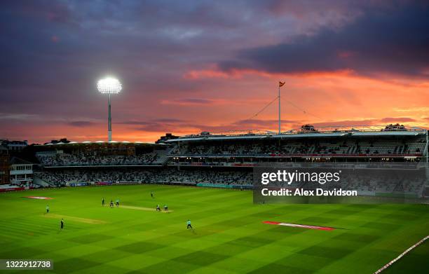 General view as the sun sets during the Vitality T20 Blast match between Middlesex and Surrey at Lord's Cricket Ground on June 10, 2021 in London,...