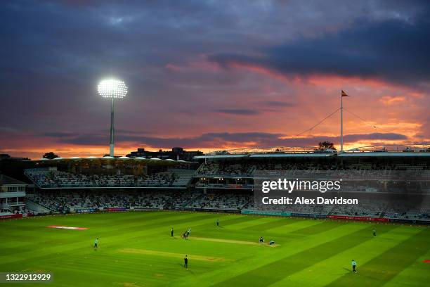 General view as the sun sets during the Vitality T20 Blast match between Middlesex and Surrey at Lord's Cricket Ground on June 10, 2021 in London,...