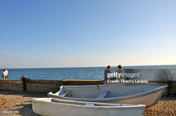 sunny afternoon along beach - freshwater bay isle of wight stock pictures, royalty-free photos & images