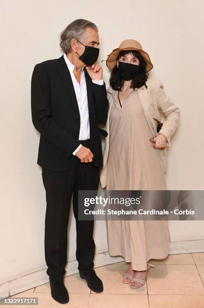 Bernard-Henri Lévy and Isabelle Adjani attend the "Une Autre Idee Du Monde" Premiere At Cinema L'Arlequin on June 10, 2021 in Paris, France.