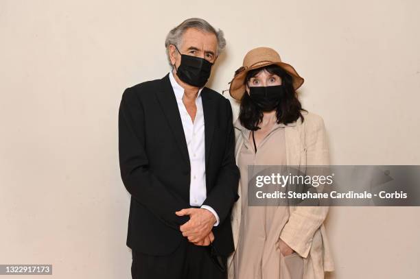 Bernard-Henri Lévy and Isabelle Adjani attend the "Une Autre Idee Du Monde" Premiere At Cinema L'Arlequin on June 10, 2021 in Paris, France.