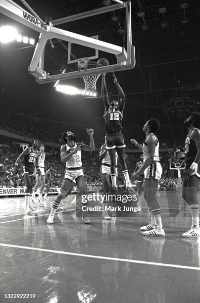 Seattle Supersonics forward Nick Weatherspoon drives to the hoop during an NBA basketball game against the Denver Nuggets at McNichols Arena on...