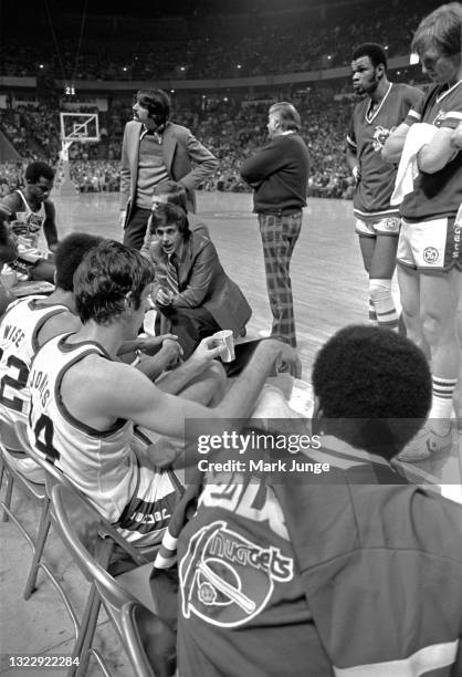 Denver Nuggets Head Coach Larry Brown makes a point to his players during a timeout in an NBA basketball game against the Seattle Supersonics at...