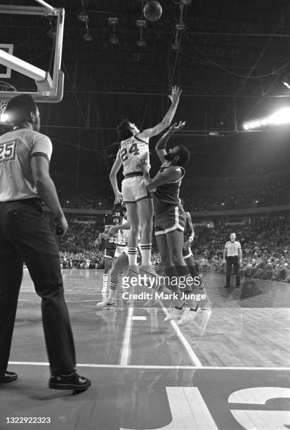 Denver Nuggets forward Bobby Jones blocks a shot by Seattle Supersonics forward Willie Norwood during an NBA basketball game at McNichols Arena on...