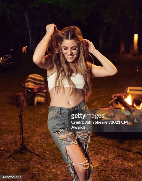 In this image released on June 9th 2021, Tenille Arts poses for the 2021 CMT Music Awards at Magnolia Acres in Columbia, Tennessee broadcast on June...