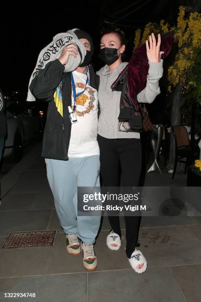 Damien Hirst and his girlfriend Sophie Cannell on a night out for dinner at Scott's restaurant in Mayfair on June 10, 2021 in London, England.