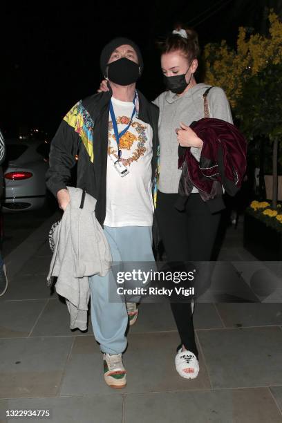 Damien Hirst and his girlfriend Sophie Cannell on a night out for dinner at Scott's restaurant in Mayfair on June 10, 2021 in London, England.