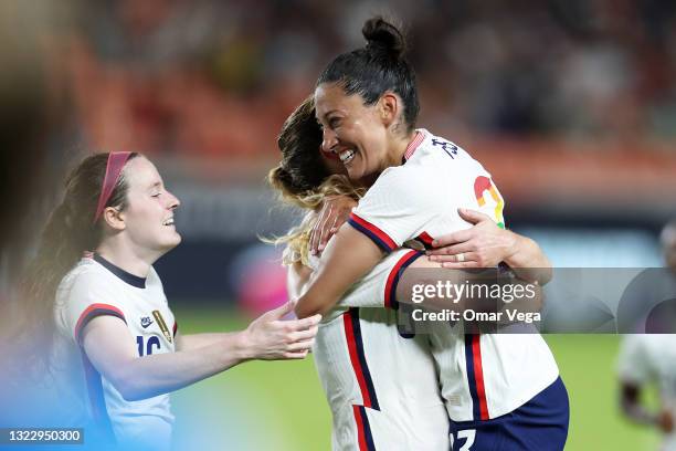 Samantha Mewis of United States cellebrates with his teammate Christen Press after scores 1st goal during the Summer Series game between United...