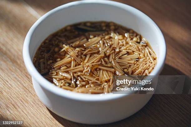 enokidake mushroom. - enoki mushroom stock pictures, royalty-free photos & images