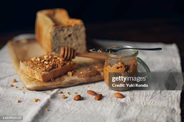 bread and peanut butter. - breaking bread stock pictures, royalty-free photos & images