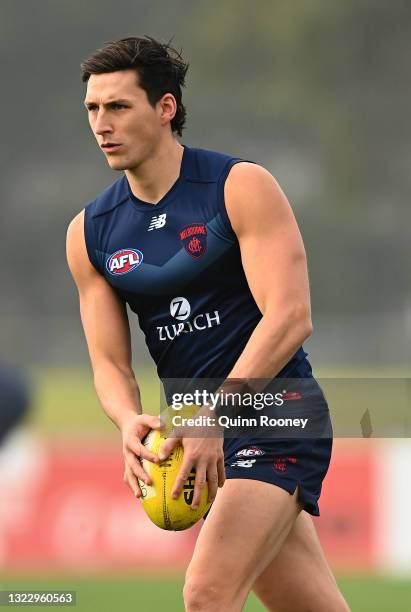 Sam Weideman of the Demons kicks during a Melbourne Demons AFL training session at Casey Fields on June 11, 2021 in Melbourne, Australia.