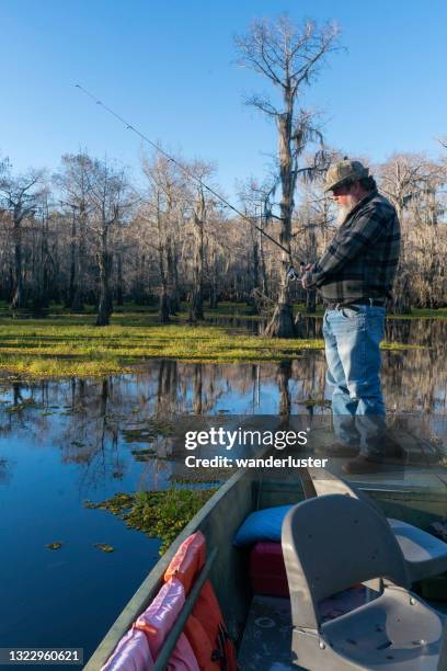 fishing on caddo lake, tx - caddo lake stock pictures, royalty-free photos & images