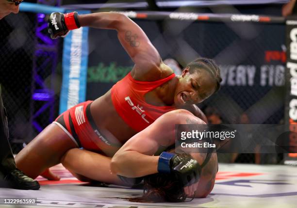 Claressa Shields of the United States punches Brittney Elkin of the United States during the third round of their lightweight bout in Ovation Hall at...