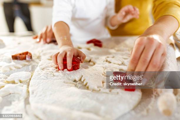 close up of making cookies in the kitchen. - cookie cutter stock pictures, royalty-free photos & images