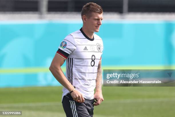 Toni Kroos of Germany arrives for the team Germany team photo at Herzo-Base Camp Herzogenaurach on June 11, 2021 in Herzogenaurach, Germany.
