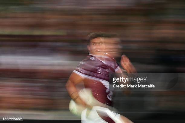 Reuben Garrick of the Sea Eagles runs in to score a try during the round 14 NRL match between the Manly Sea Eagles and the North Queensland Cowboys...