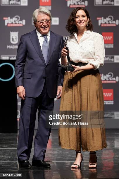 Enrique Cerezo and Madrid president, Isabel Diaz Ayuso receive an honorific award during the presentation of Platino Awards 2021 on June 11, 2021 in...