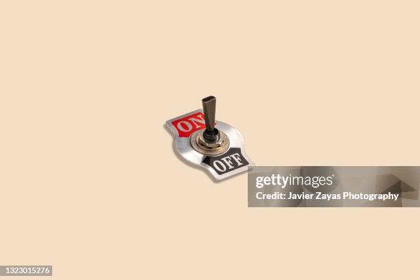 toggle switch on a pastel background - turning on or off stock pictures, royalty-free photos & images