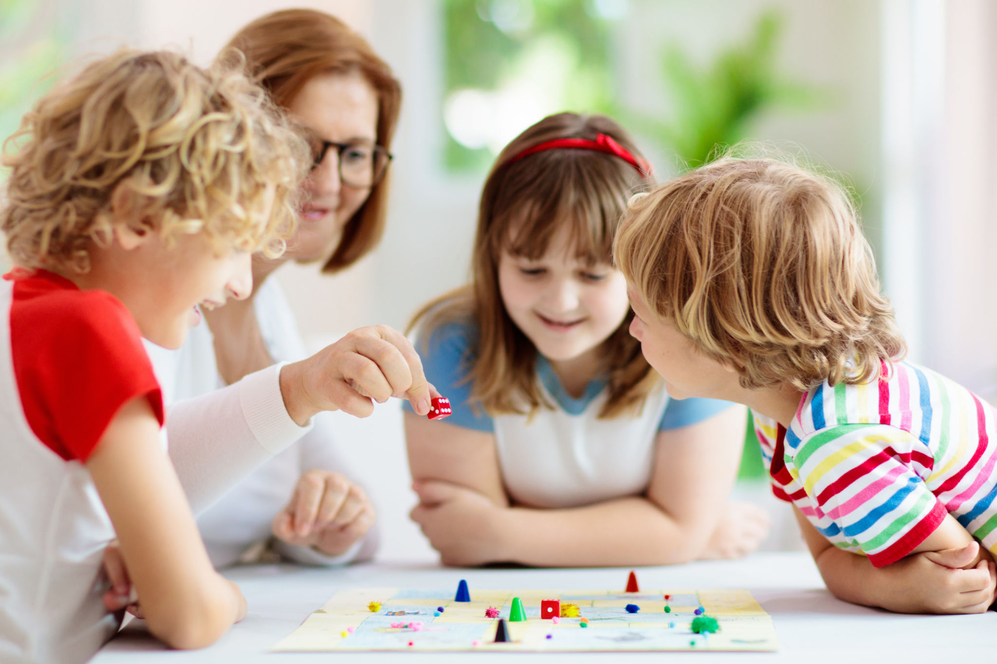 family playing board games