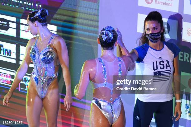 Head coach Andrea Fuentes of the United States team shakes hands with one of her team members after the Team Free Routine of the FINA Artistic...