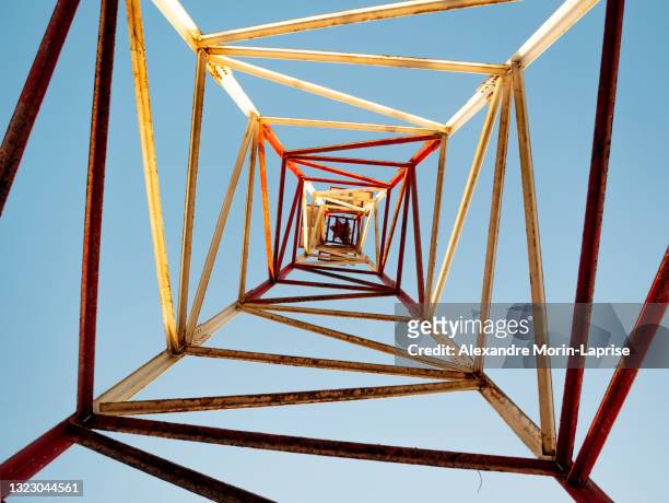 the top of the metal tower known as the punta gallinas (cape gallinas, "cape hens") lighthouse against a backdrop of clearly sky - high up stock pictures, royalty-free photos & images