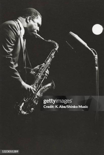 John Coltrane plays into a Neumann microphone, Tokyo, Japan, 11th July 1966.