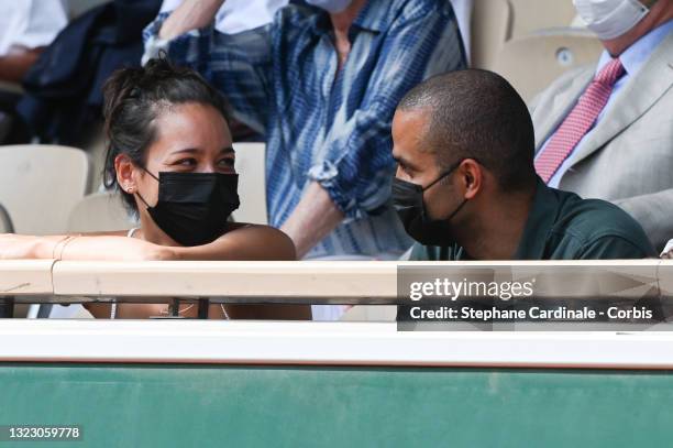 Tony Parker and Alizé Lim attend the French Open 2021 at Roland Garros on June 11, 2021 in Paris, France.