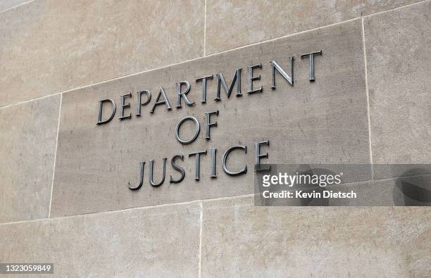 The U.S. Department of Justice is seen on June 11, 2021 in Washington, DC. Trump's Justice Department subpoenaed Apple for data from House...