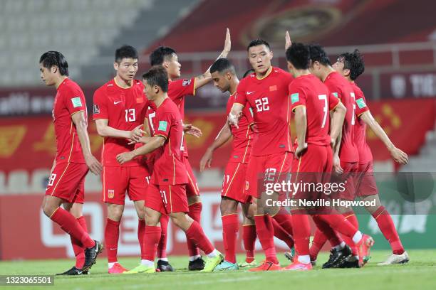 China national team players congratulate each other after Wu Lei scored their second goal during the 2022 FIFA World Cup Asian Qualifiers Group match...