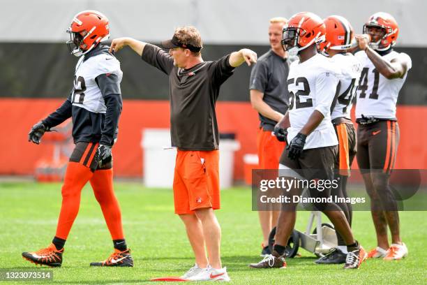 Linebackers coach Jason Tarver of the Cleveland Browns directs a drill during an OTA at the Cleveland Browns training facility on June 9, 2021 in...