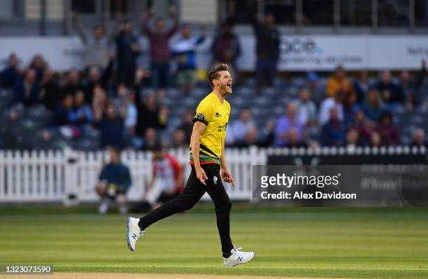 David Payne of Gloucestershire celebrates taking the wicket of Ravi Bopara of Sussex during the Vitality T20 Blast match between Gloucestershire and...