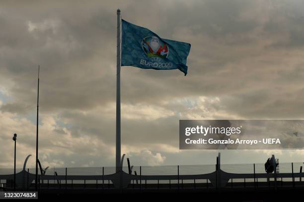 Euro 2020 giant flag flutters outside Gazprom Arena stadium ahead of the UEFA Euro 2020 Championship Group B match between Belgium and Russia at...