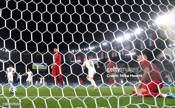 Merih Demiral of Turkey looks dejected after scoring an own goal for Italy's first goal during the UEFA Euro 2020 Championship Group A match between...