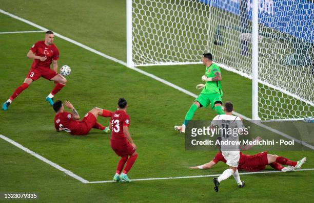 Domenico Berardi of Italy crosses the ball in incident leading to Merih Demiral of Turkey scoring an own goal for Italy's first goal during the UEFA...
