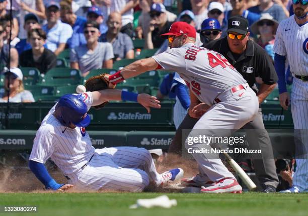 Paul Goldschmidt of the St. Louis Cardinals is unable to pick off Ian Happ of the Chicago Cubs during the fifth inning of a game at Wrigley Field on...