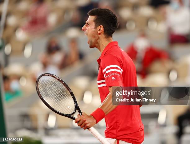 Novak Djokovic of Serbia celebrates during his Men's Singles Semi Final match against Rafael Nadal of Spain on day Thirteen of the 2021 French Open...