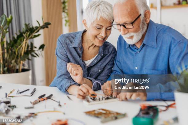 senior couple - resistor stock pictures, royalty-free photos & images