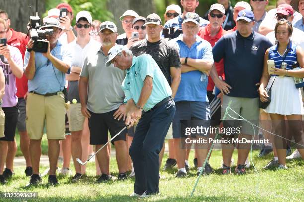 Fred Couples hits his second shot on the 15th hole during the first round of the American Family Insurance Championship at University Ridge Golf...