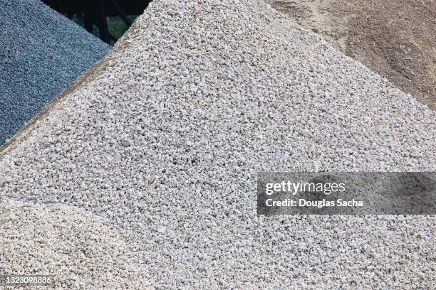 gravel stone pile cones off for nearby construction project - limestone stock pictures, royalty-free photos & images
