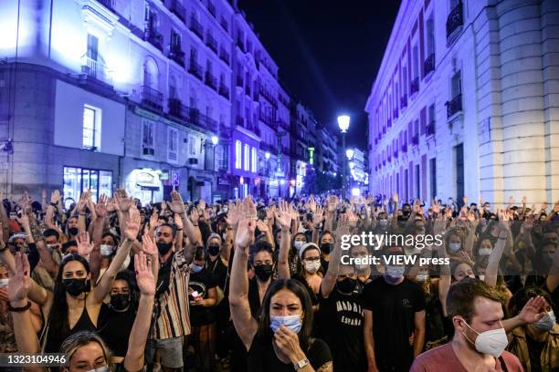 People gather in La Puerta del Sol to protest against "feminicides" on June 11, 2021 in Madrid, Spain. Protestors gathered a day after the Guardia...