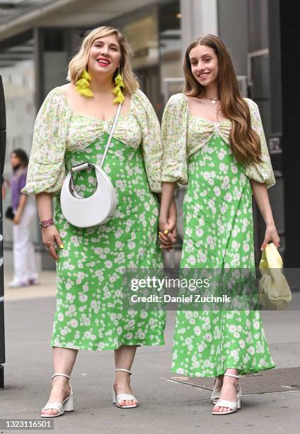 Michelle Blashka and Ella Blashka are seen wearing green floral dresses on June 11, 2021 in New York City.