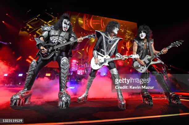Gene Simmons, Tommy Thayer, and Paul Stanley of KISS perform onstage during the Tribeca Festival screening of "Biography: KISStory" at Battery Park...