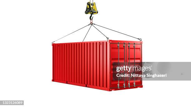 red cargo container hoisted by hook isolated on whitebackground. 3d rendering illustration of a shipping import and export. - container stock-fotos und bilder