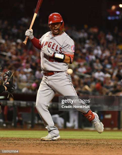 Kurt Suzuki of the Los Angeles Angels is hit by a pitch from Stefan Crichton of the Arizona Diamondbacks during the eighth inning at Chase Field on...