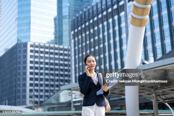 making appointment by phone - economist stock-fotos und bilder