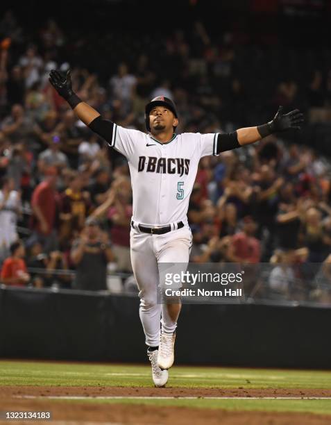 Eduardo Escobar of the Arizona Diamondbacks celebrates after hitting a game tying solo home run against the Los Angeles Angels during the ninth...