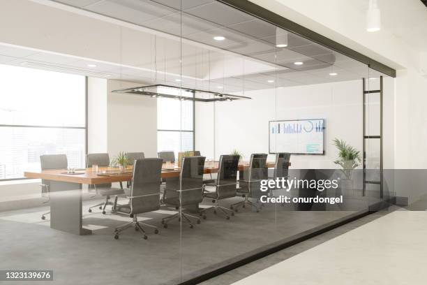 outside view of empty meeting room with table and office chairs - modern room stock pictures, royalty-free photos & images