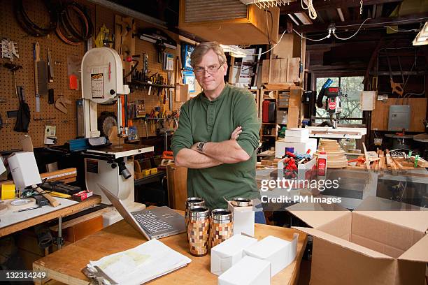 man in his wood shop - wood worker posing ストックフォトと画像